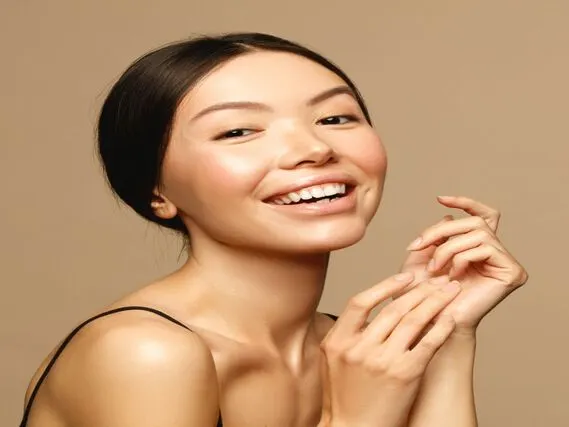 Beautiful woman in full natural looking makeup